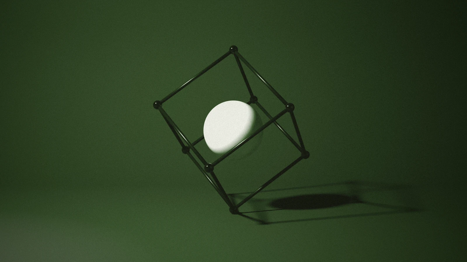 A wire cube balanced on one corner around a bone sphere, on Moss